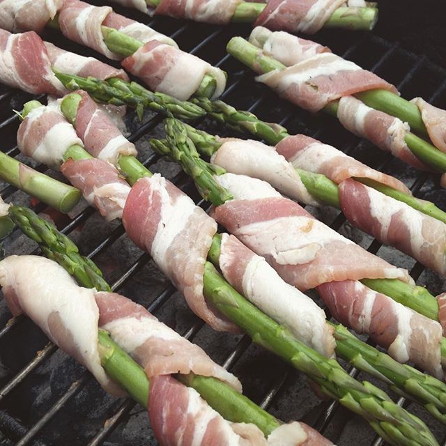 How to make grilled asparagus unhealthy. Step 1: Wrap in bacon. Step 2: Grill. #bacon #asparagus #weber #lunch