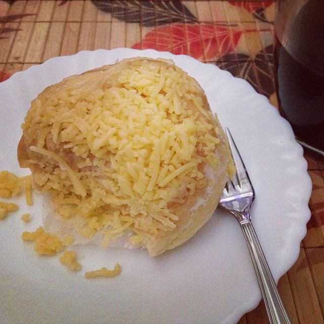 Ensaymada for merienda (Sweet brioche bread topped with cheese) @filipinofood #snack