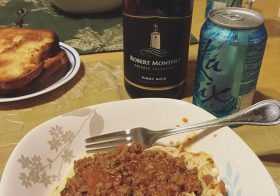 I'm having some meat sauce pasta with my wine.  Thanks for supper, sis @runtricpa #carboloading #im703santacruz #longcoursetriathlon [instagram]