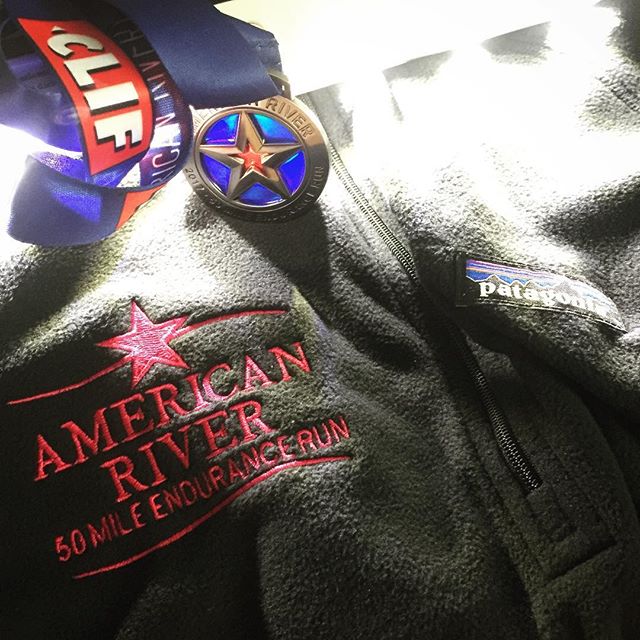 A very special #medalmonday for this recovering runner! This #AR50miler one has a bit of translucent material where the light can shine through. Plus the finisher's #patagonia fleece pullover is quite comfy! #nuunlife #trailjunkie #racewithbase #baseperformance #trailrunning #taur #ultramarathon [instagram]